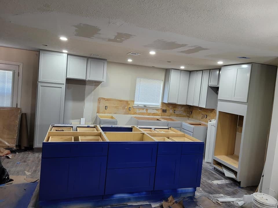 Gray-blue kitchen cabinets refinished in Richmond, TX