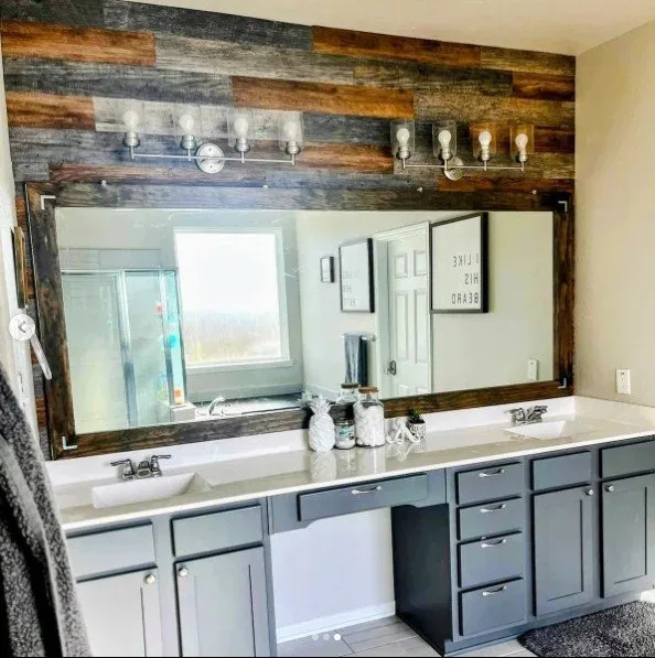Hale Panel accent wall in Sugar Land bathroom with gray cabinets