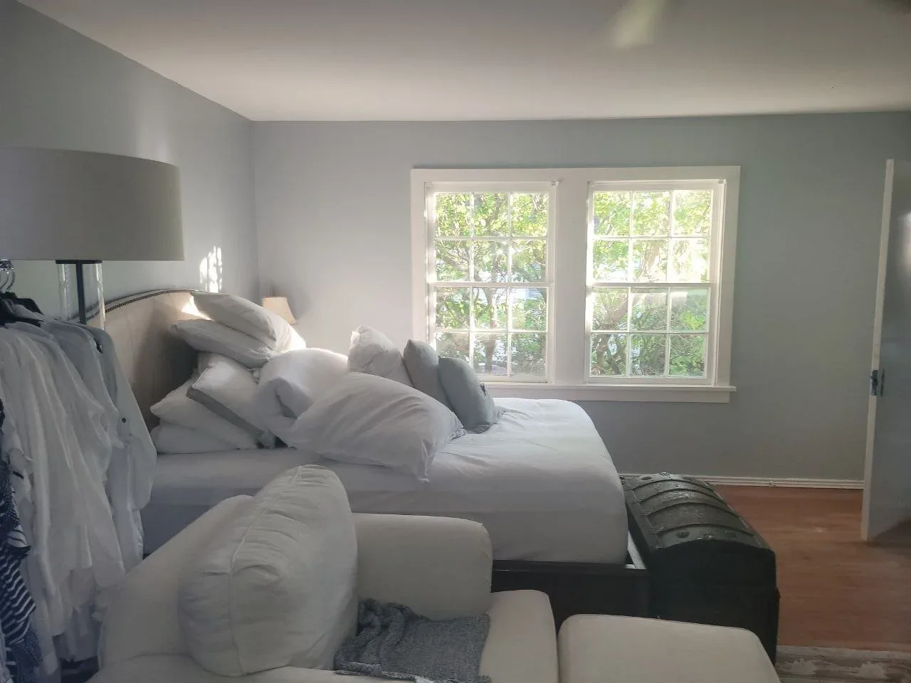 Bedroom with light blue walls in West Houston, TX