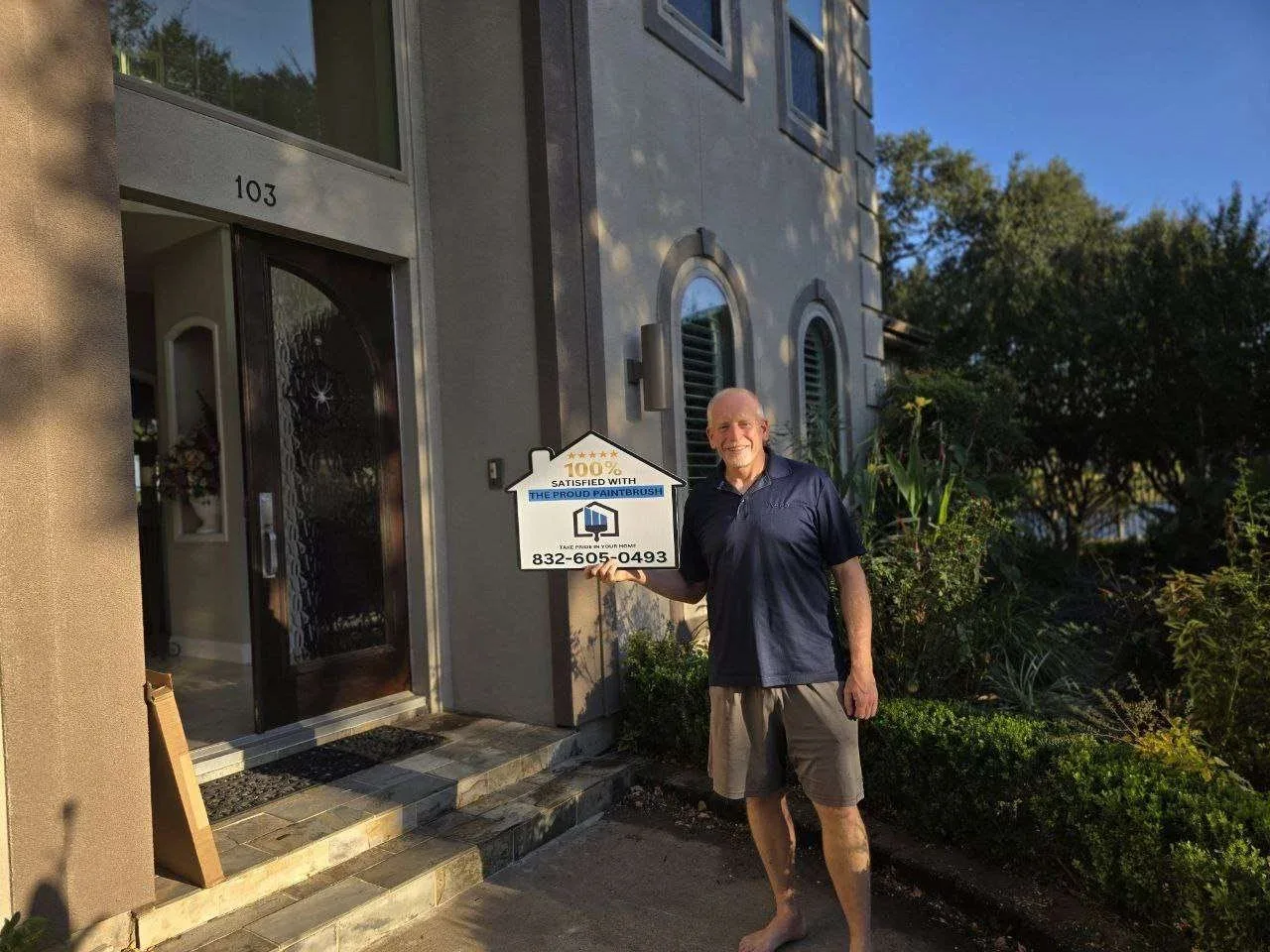 freshly painted two-story home exterior in Sugar Land with smooth siding and crisp trim lines Image 2
