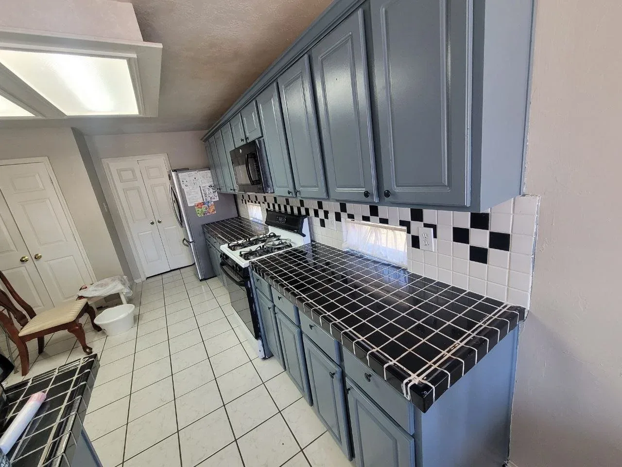 Gray Kitchen Cabinet Repaint in Sugar Land, TX by The Proud Paintbrush