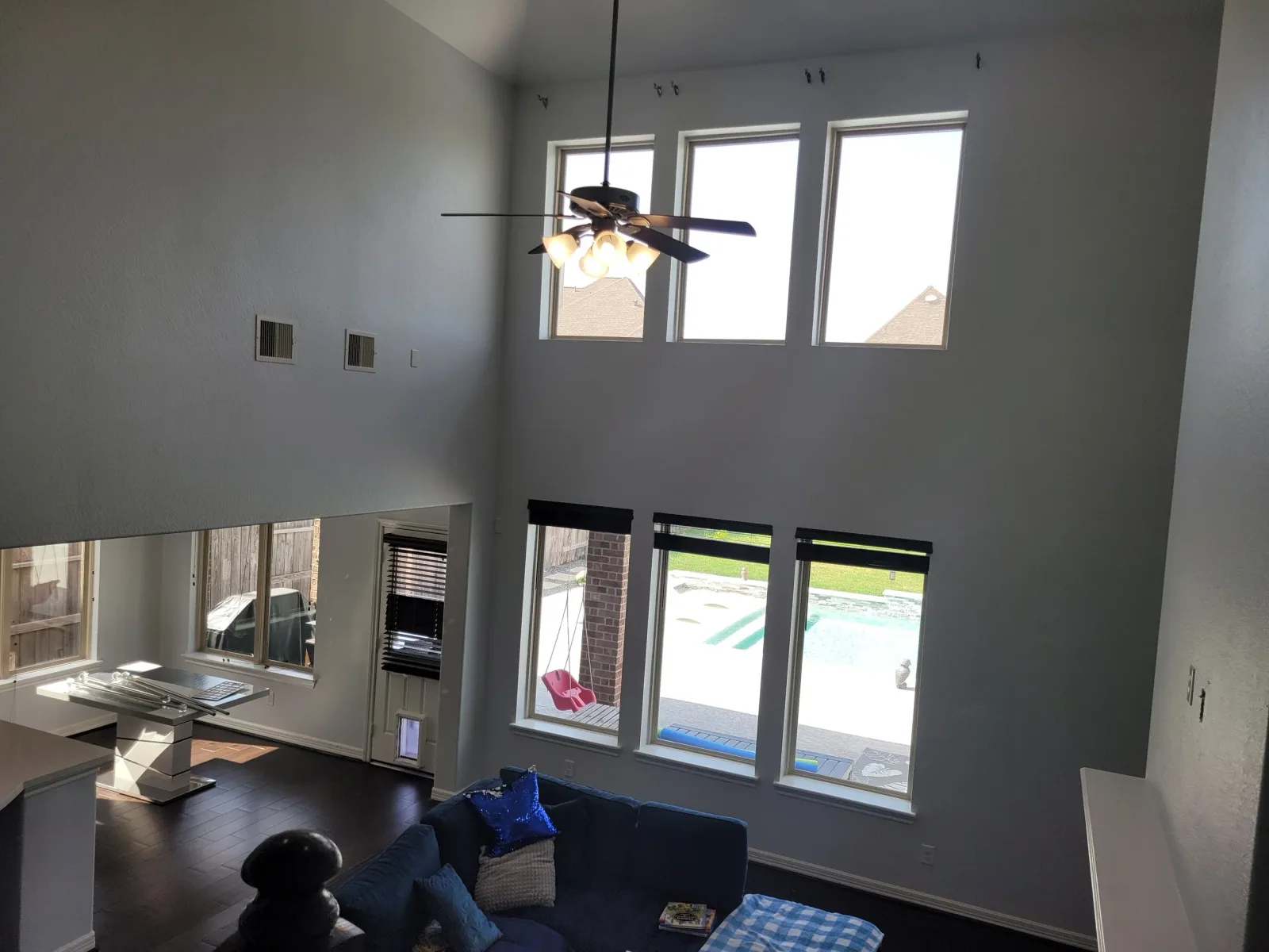 Gray Two Story Living Room Repaint in Richmond, TX by The Proud Paintbrush