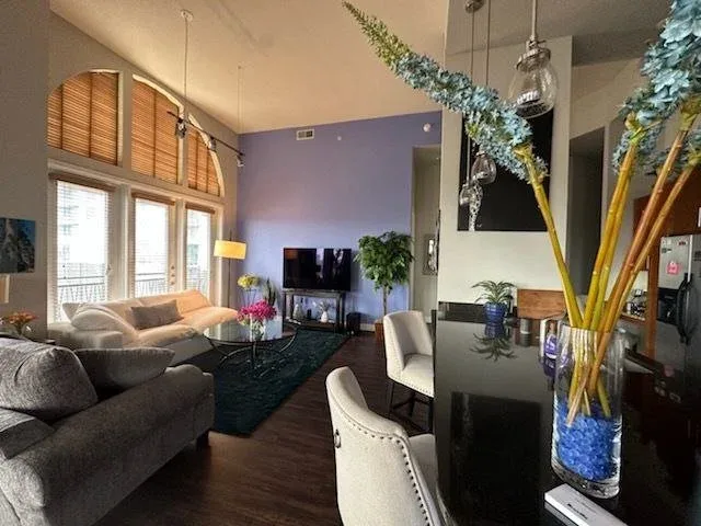 periwinkle accent wall in Sienna bedroom with natural light