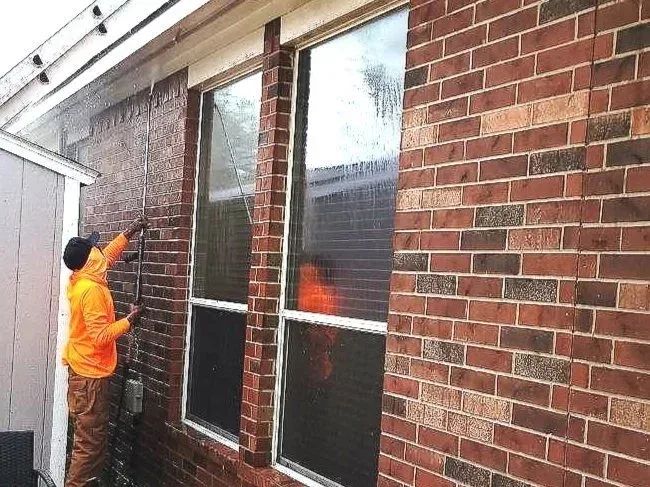 painter, pressure washing the house, prepping for paint