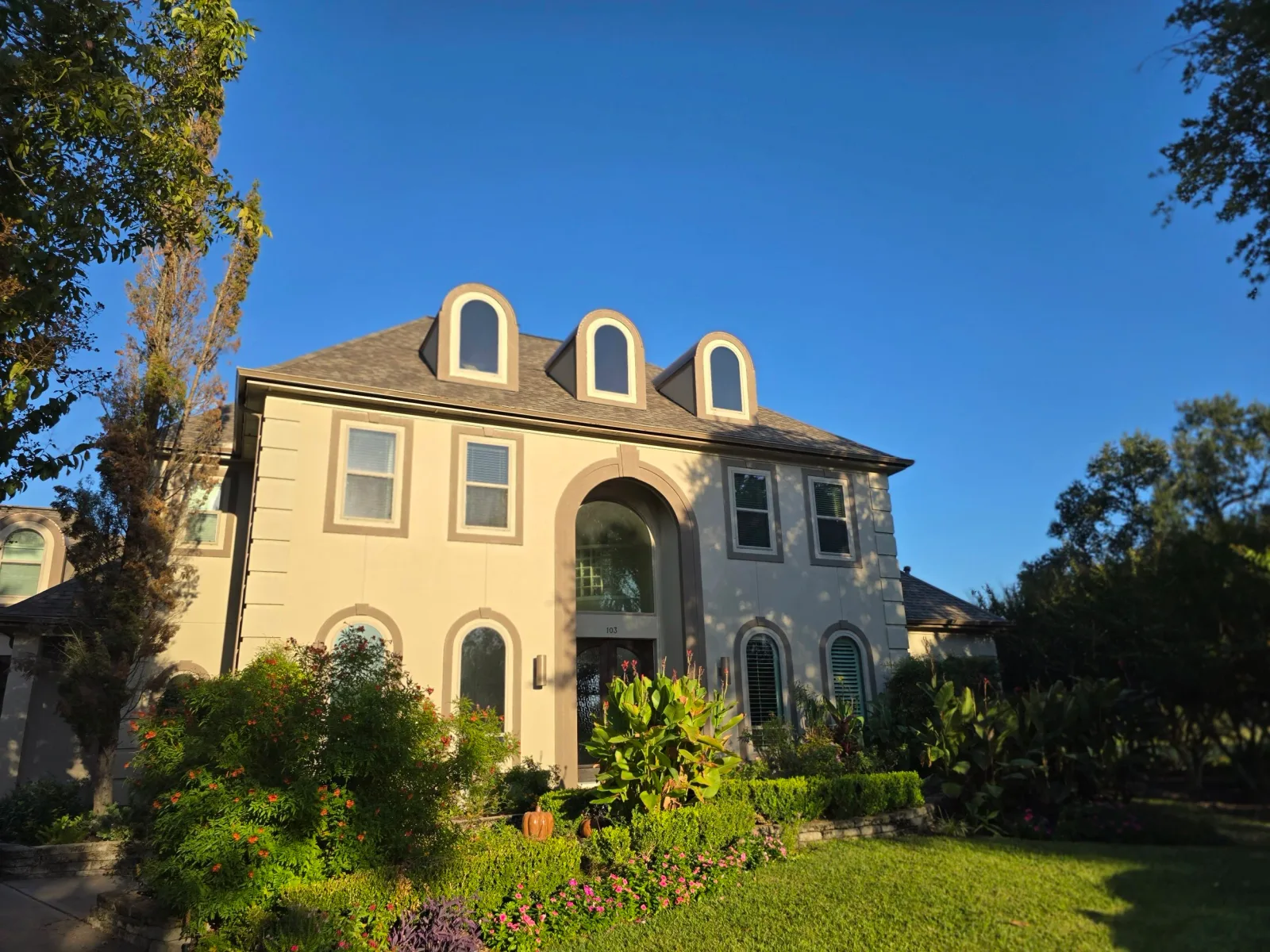 Freshly painted luxury exterior home in Richmond, TX by The Proud Paintbrush