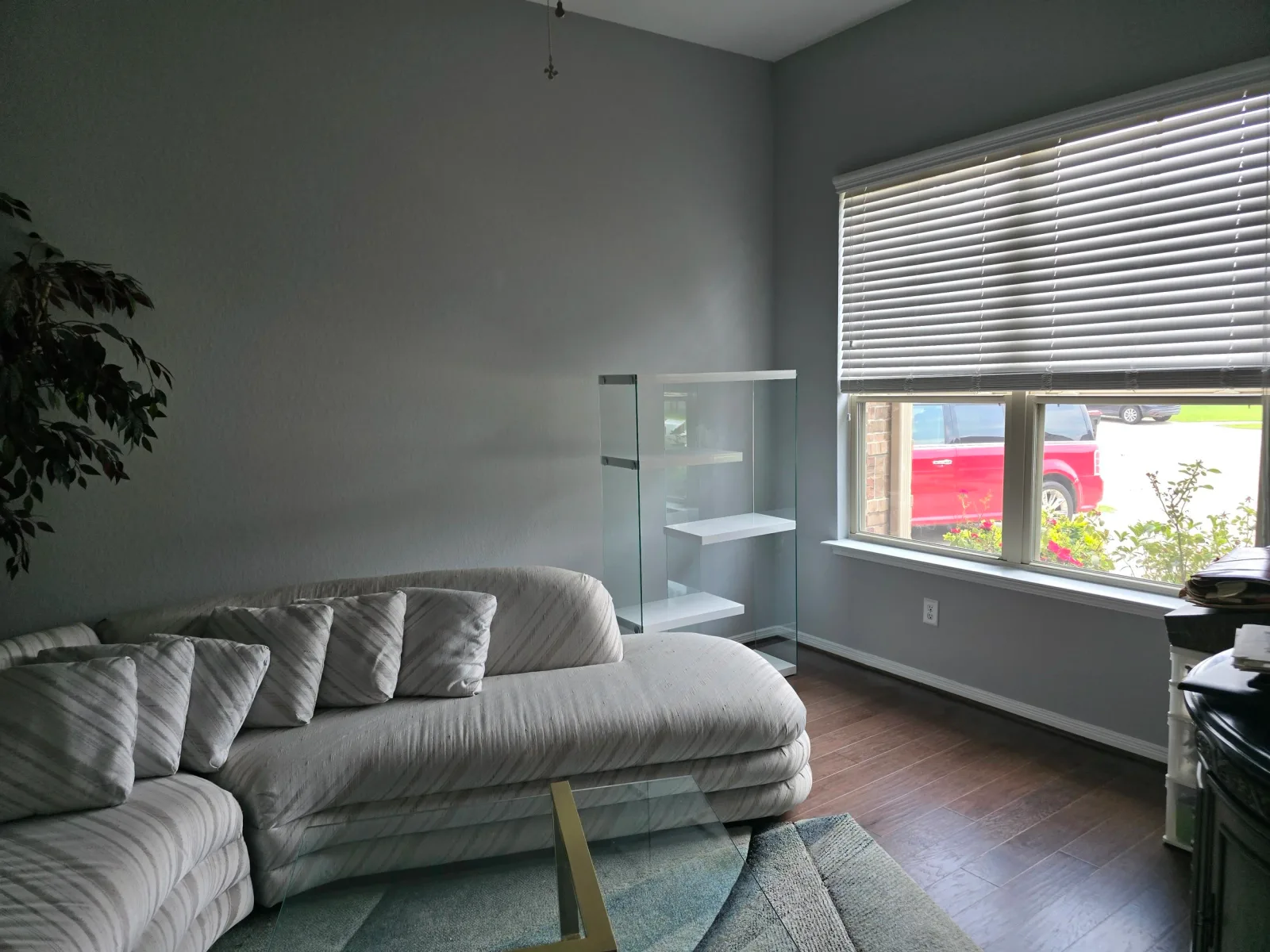Freshly painted sitting room with dark gray walls in Fulshear, Texas