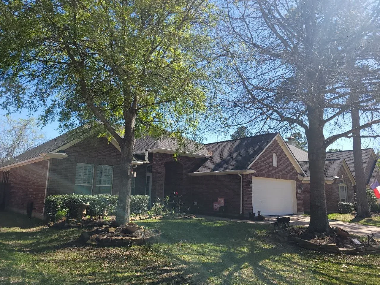 Freshly painted brick house with white trim in Katy, Texas